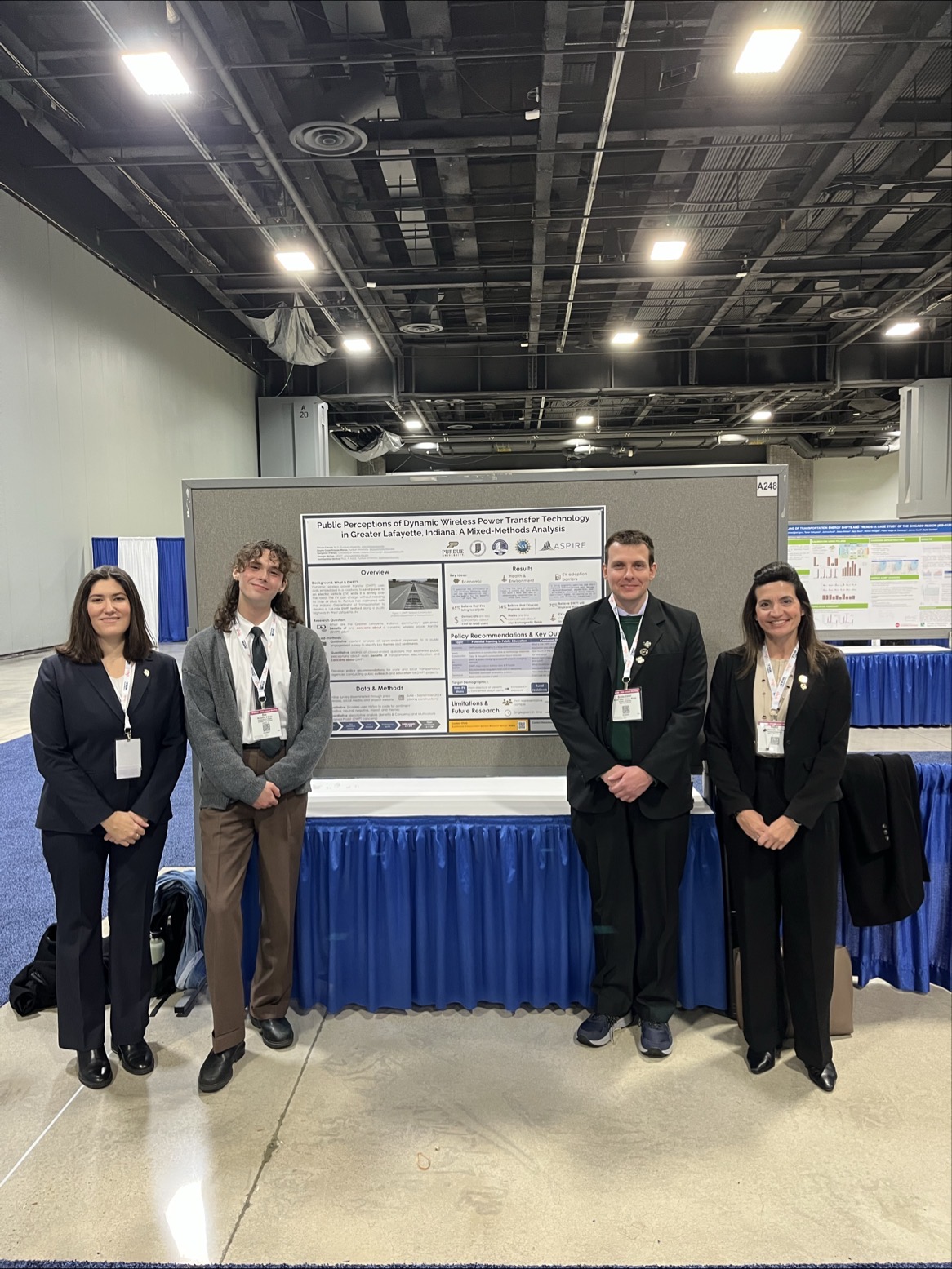 Purdue research group next to their poster at the TRB conference.
